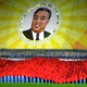 Illustration for article titled The Amazing, Colorful Flip Card Propaganda Mosaics of North Korea